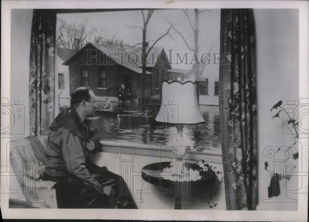 1951 Press Photo Roy Ramozykowski resting in the front room of his home. - Historic Images