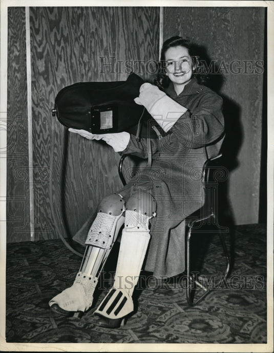 1942 Doris Gibson with latest & safest clothing for outdoor workers - Historic Images