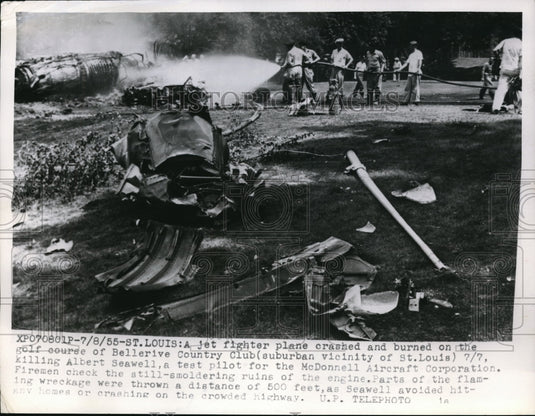 1955 Press Photo Firemen putting blaze out of jet fighter plane crashed - Historic Images