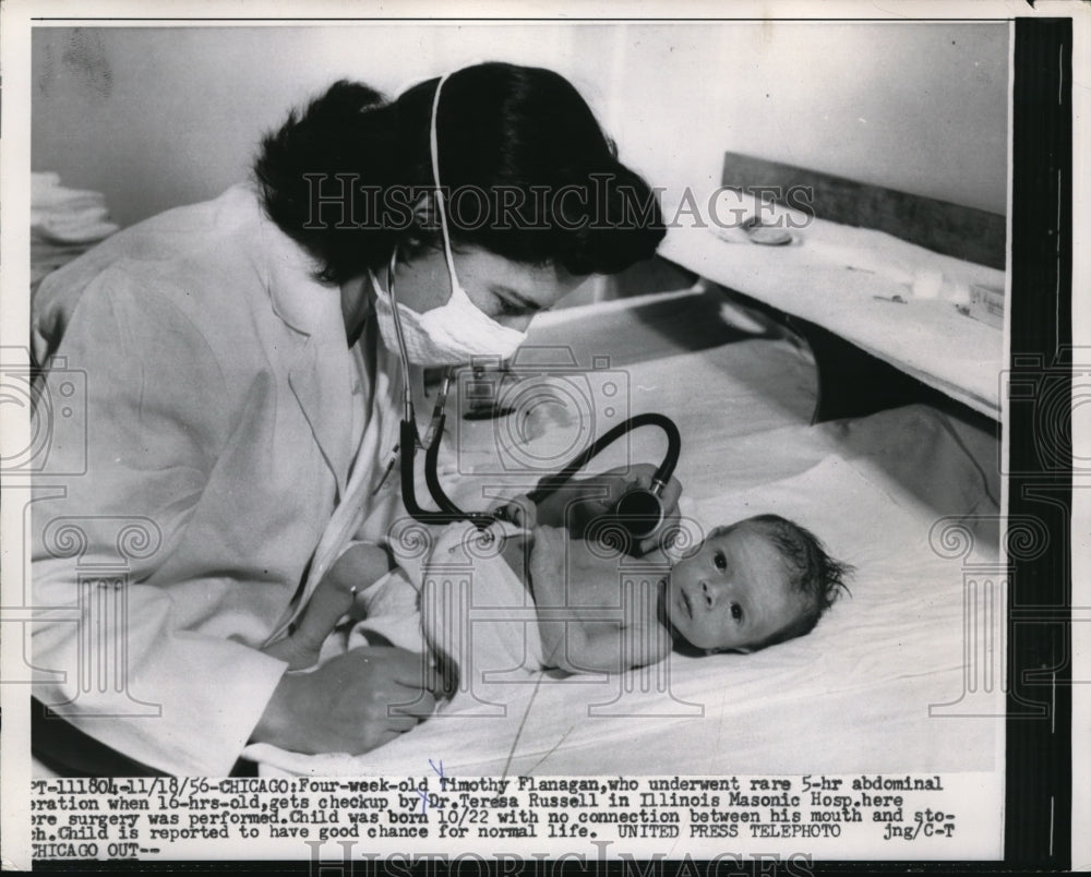 1956 Press Photo Four Week Old Timothy Flanagan Examined - Historic Images