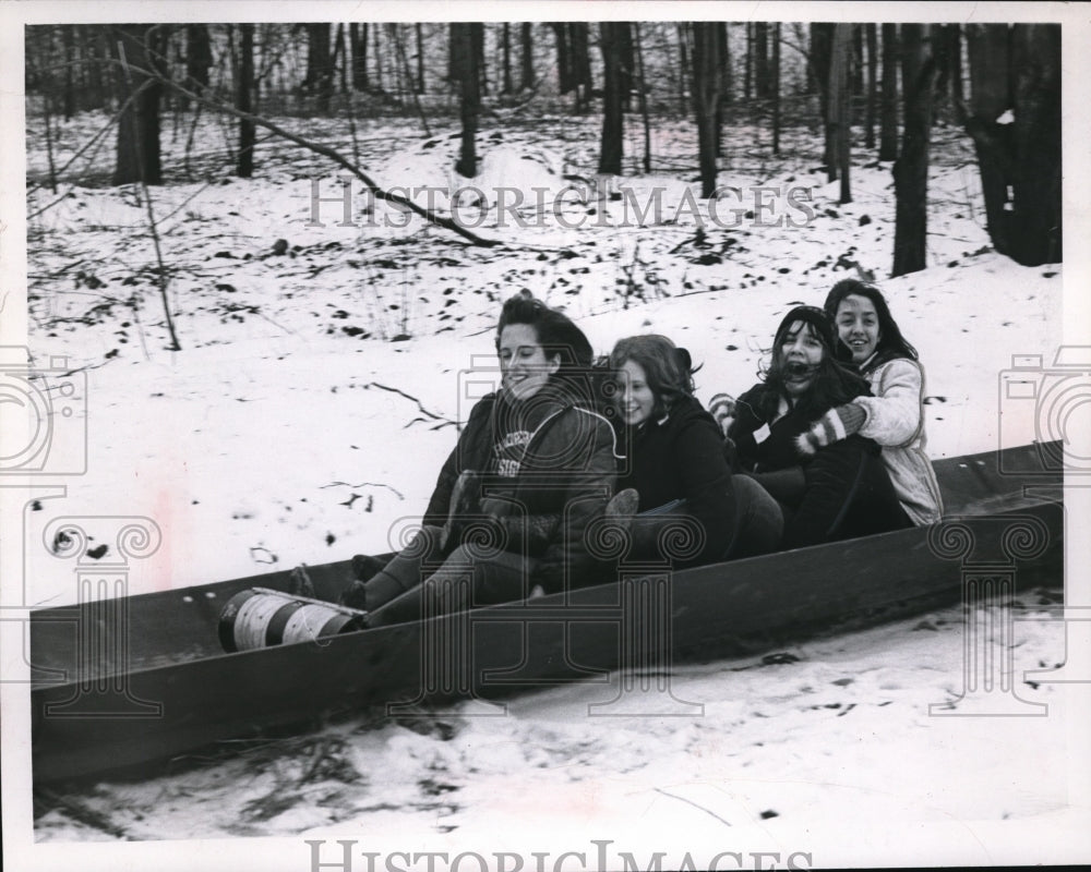 1967 Press Photo J Fihn, A CharnamL Martel, R Estrin tobogganing in Ohio - Historic Images