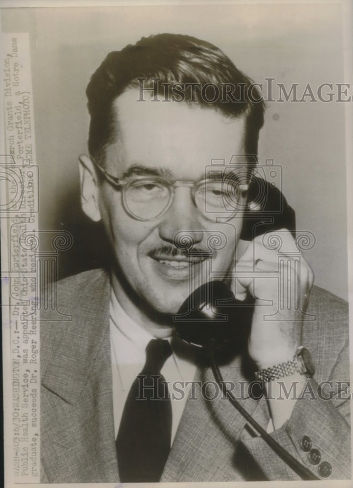 1947 Press Photo Dr. John Porterfield Ohio State Health Director On Phone - Historic Images