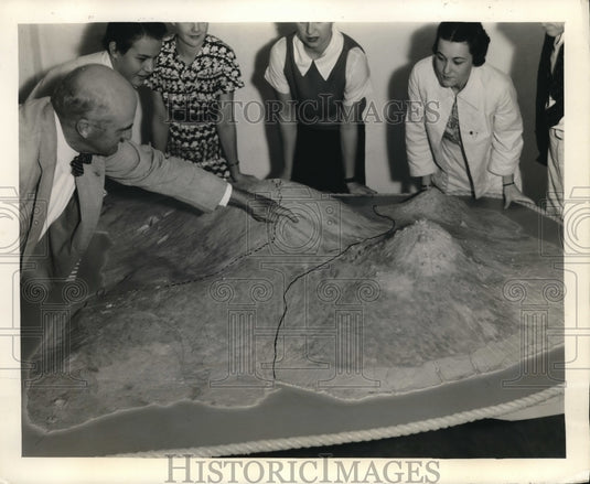 1937 Dr. Thomas Jaggar points to be followed on the highway to fire-Historic Images