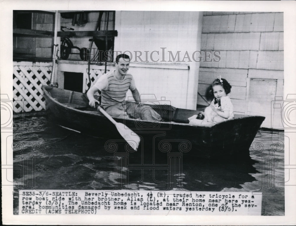 1950 Press Photo Beverly Unbedacht traded her tricycle for a boat near Renton - Historic Images