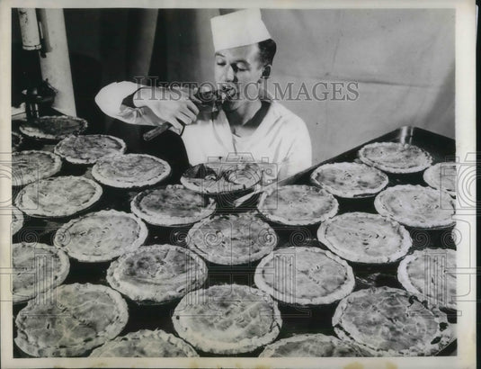 1944 Press Photo Arnold M. Manthei doing a food taste. - Historic Images