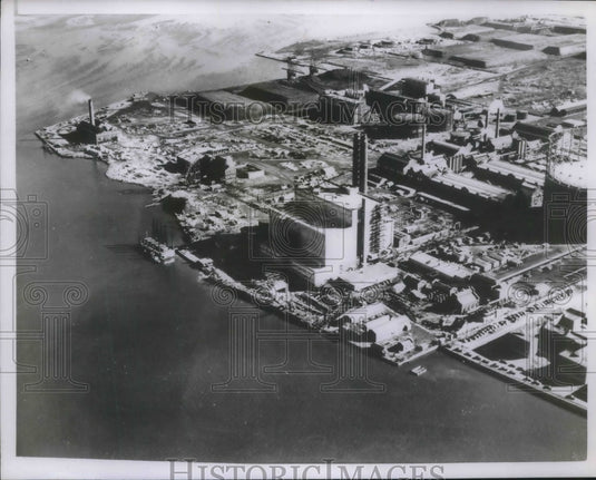 1955 Press Photo Aerial view of NY power plant & stockpiles of coal - Historic Images