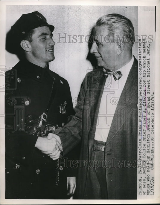 1953 Press Photo patrolman Frank Hutchinson receives congrats Chief James - Historic Images