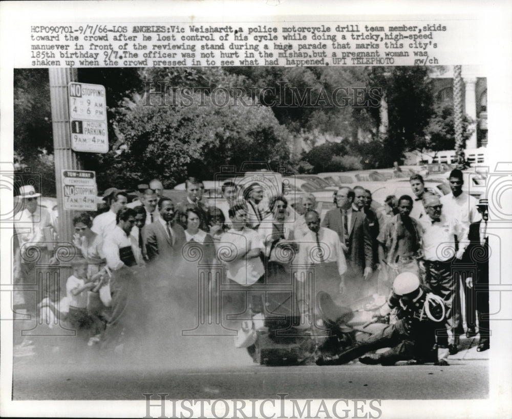 1966 Press Photo Cop Motorcycle Drill Team Member Skids Into Parade Crowd - Historic Images