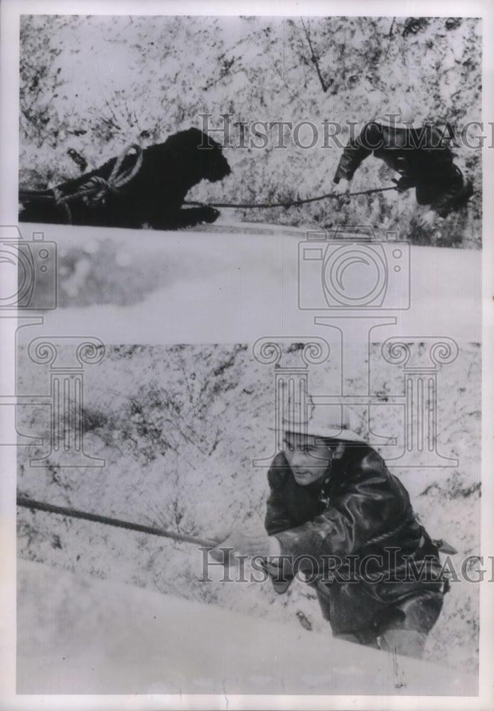 1952 Press Photo Rosseau Rescuing His Dog - nec48975 - Historic Images