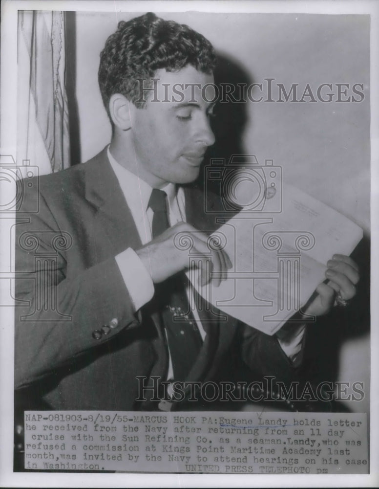 1955 Press Photo Eugene Landy received a letter from the Navy. - Historic Images