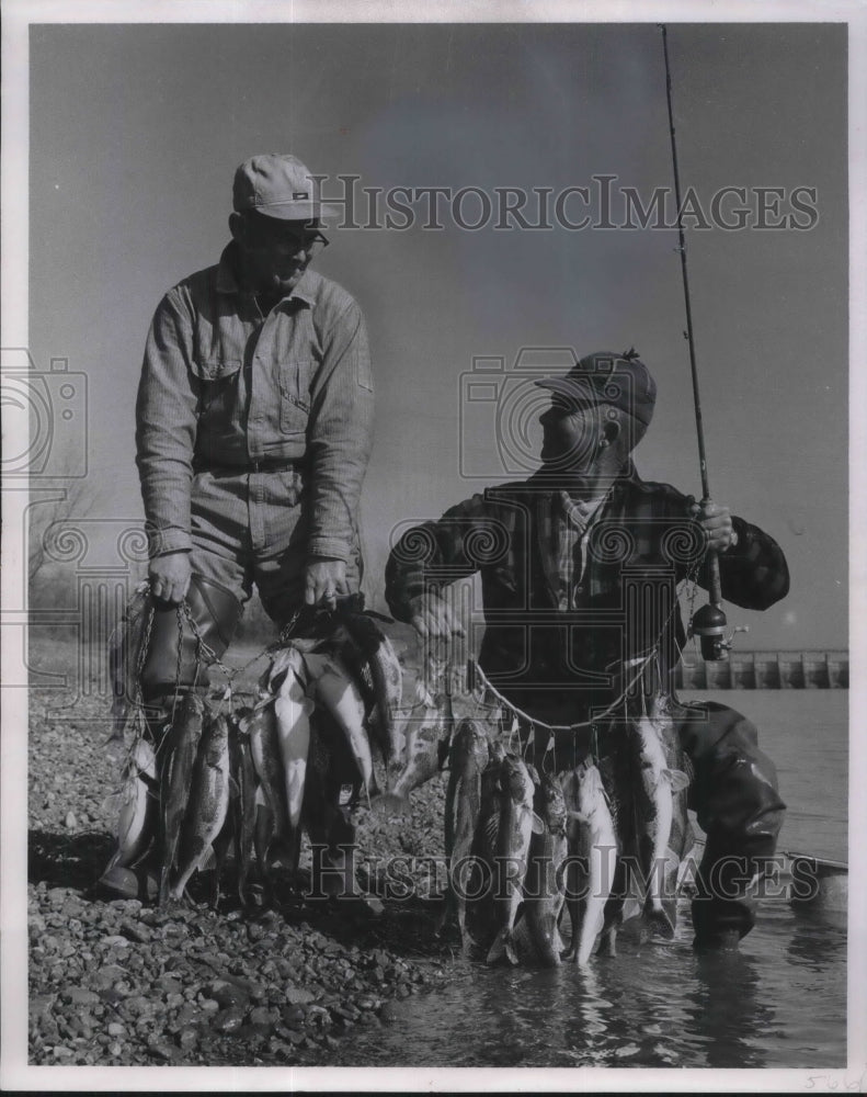 1969 Press Photo Two Men Fishing with their Catch - Historic Images