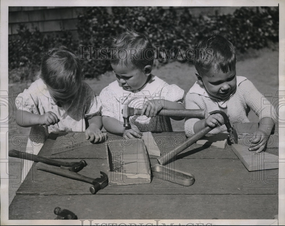 1935 Press Photo 3 kids having fun with hand tools. - Historic Images