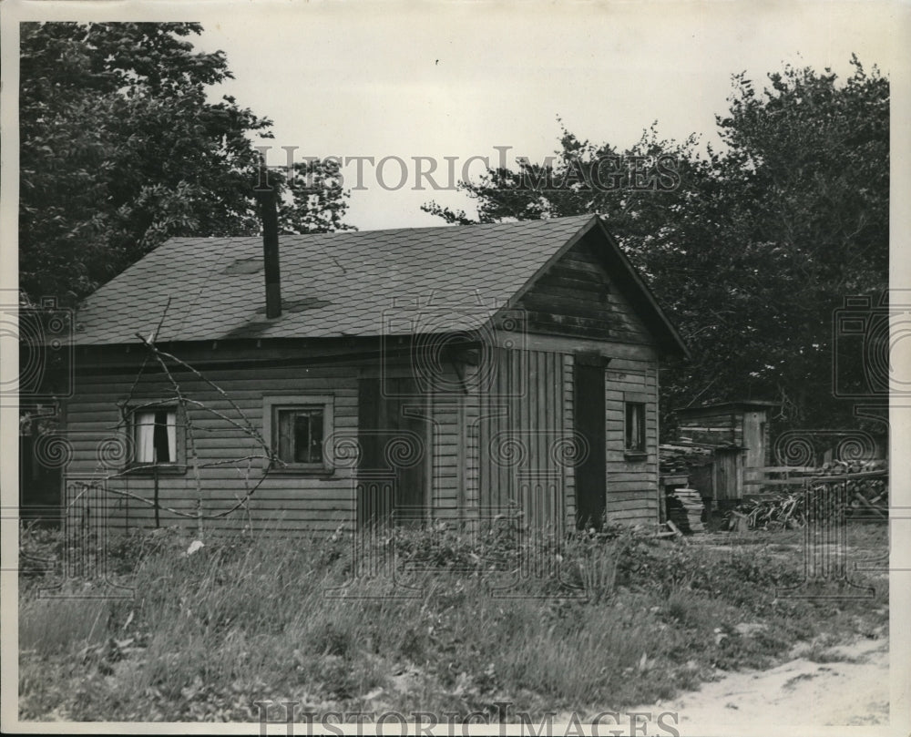 1934 Press Photo A wooden building made of logs - Historic Images