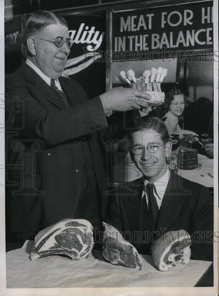 1934 Press Photo Paul E. Brown being crowned by B.T. McCarthy as meat champion - Historic Images