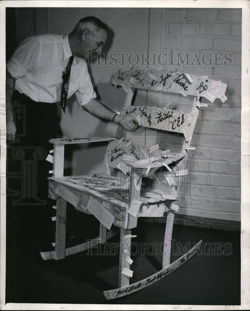 1955 Press Photo Ole rockin chair. Abraham L. Young retires. gets signed chair. - Historic Images