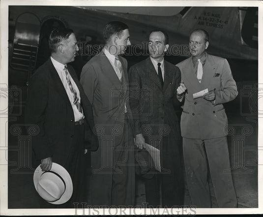 1940 Inspect s for site of possible location of an airplane factory - Historic Images