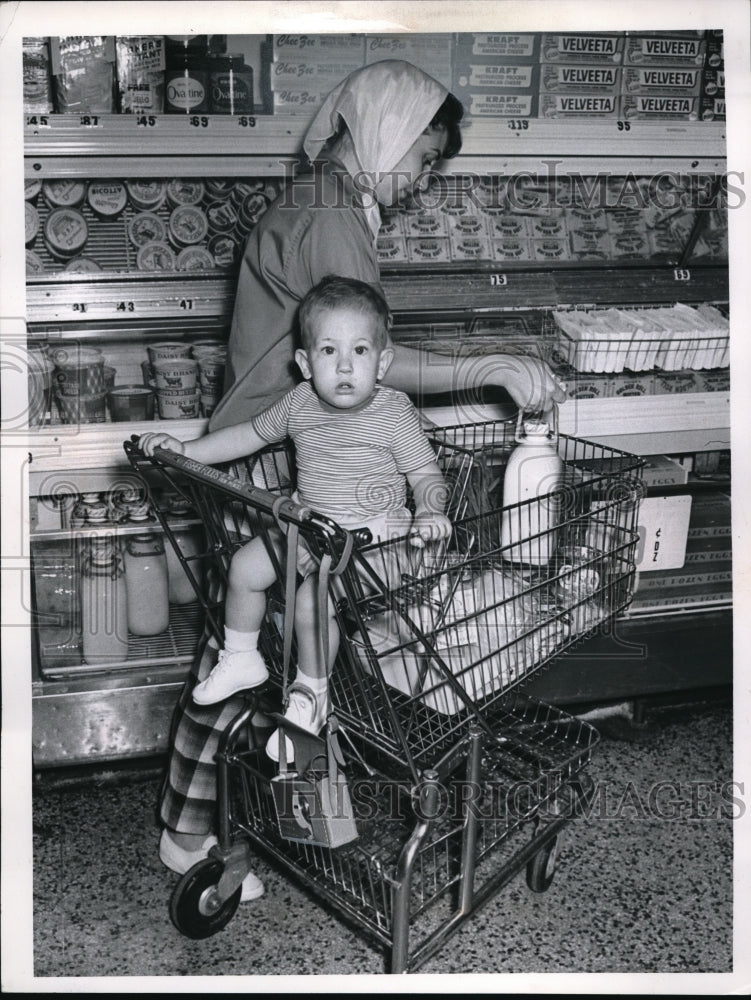 1961 Mrs. Beverly Lett and her son at Fisher's Master Market. - Historic Images