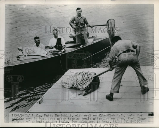 1951 Press Photo Phila, Pa. Patty Manichini with seal Elke Club Raft, Fred Ulmar - Historic Images