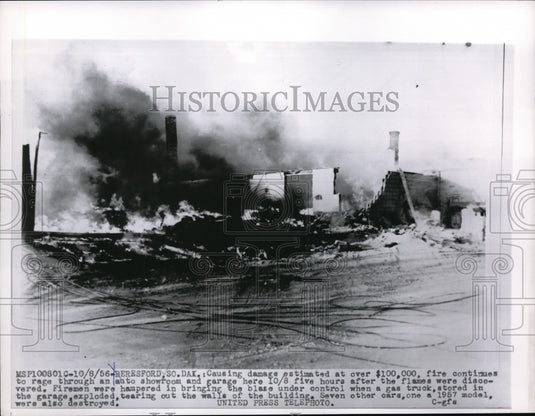 1956 Press Photo Beresford,S. Dak fire destroys auto showroom & garage - Historic Images