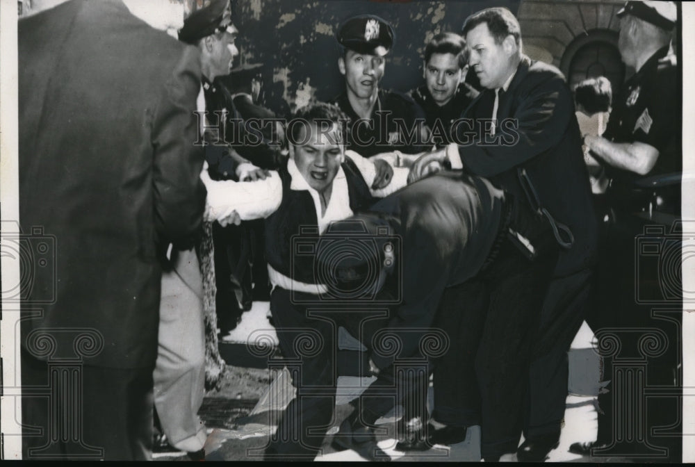 1958 Press Photo Policeman Tackles Picket at Soviet United Nations Headquarters - Historic Images