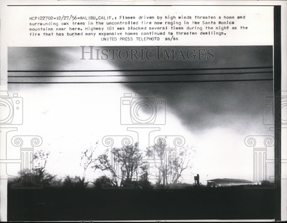 1956 Press Photo Malibu, Calif. Out of control forest fire approaches homes - Historic Images