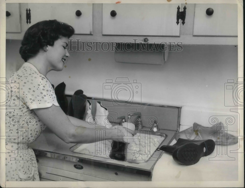 1954 Homemaker Cleaning Footwear in Sink  - Historic Images