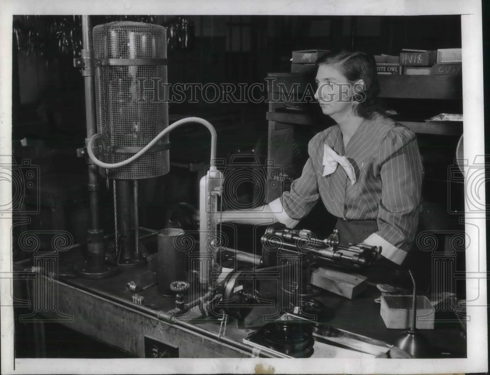 1944 Mrs.Helen Monks operated at the United Electronics Company. - Historic Images