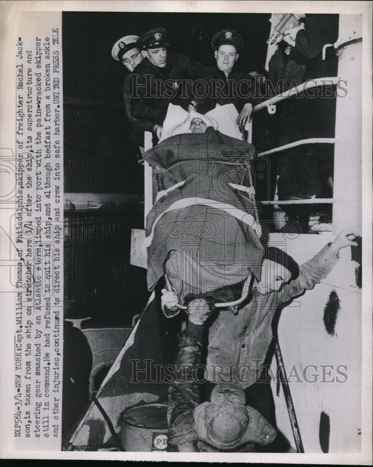 1952 Press Photo Skipper William Thomas on stretcher after ship's accident - Historic Images