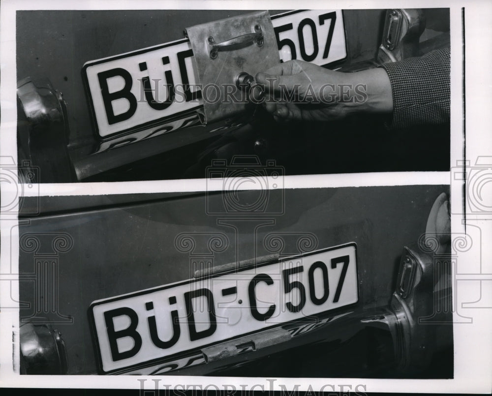 1956 Press Photo Frankfurt inventor with a locking license plate cover . - Historic Images