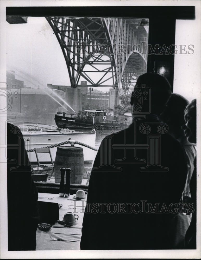 1969 Tug Boat Shooting Water Under a Bridge - Historic Images