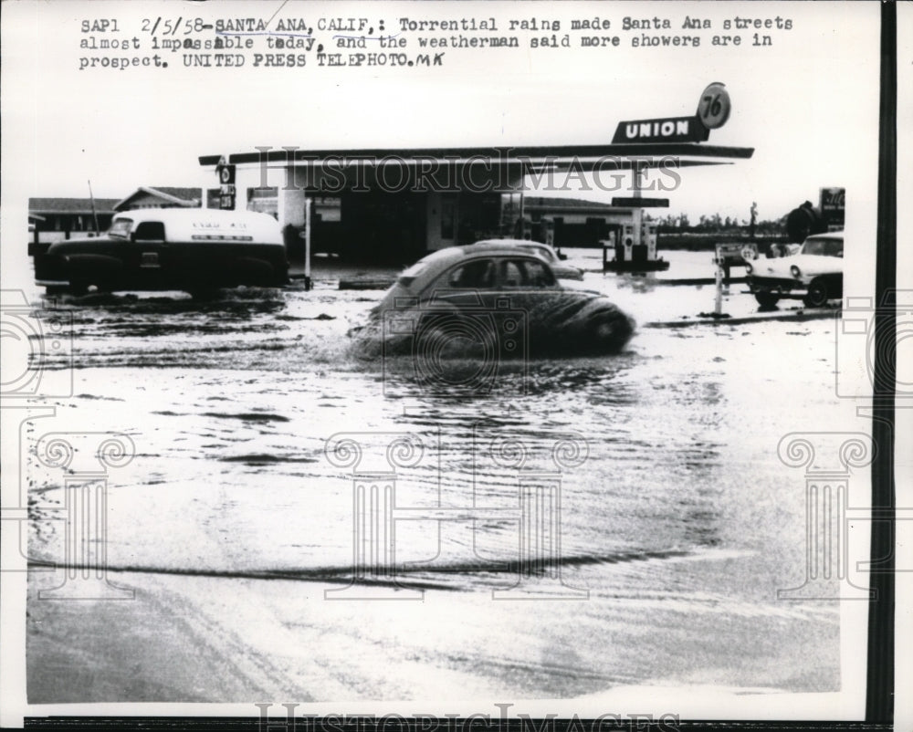 1958 Press Photo Santa Ana, Calif flooded streets almost impossible to move - Historic Images