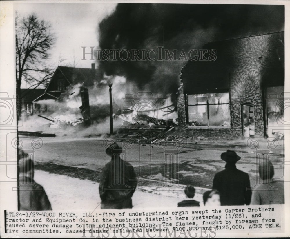 1950 Press Photo Flames destroy Carter Brothers Tractor and Equipment Co. - Historic Images