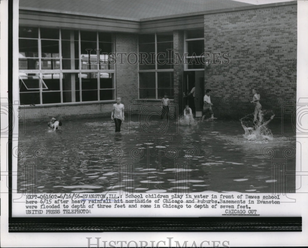 1956 Press Photo School Children Play in Flood Water at Dawes School in Chicago - Historic Images