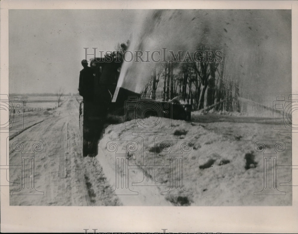 1936 Press Photo Rotary Snow Plow Hurls Snow Into Air - nec64556 - Historic Images