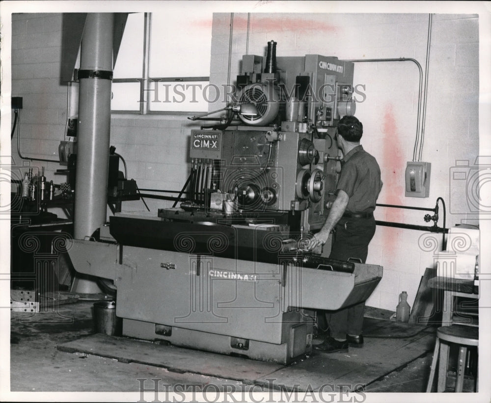 Press Photo Drilling Man Block - Historic Images