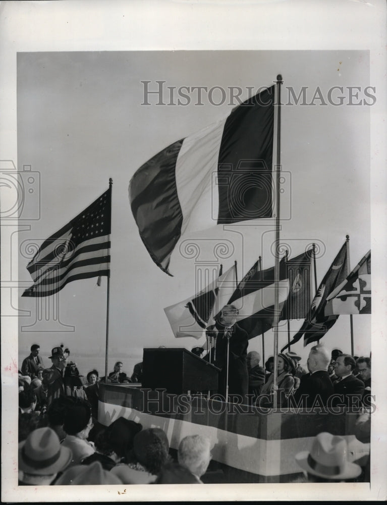 1949 Frech Ambassador Henry Bopnnet gives an address at Bedloes Island at the ceremony o - Historic Images