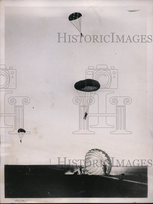1936 Press Photo Parachute jumpers after the mass jumping feature - nec68155 - Historic Images