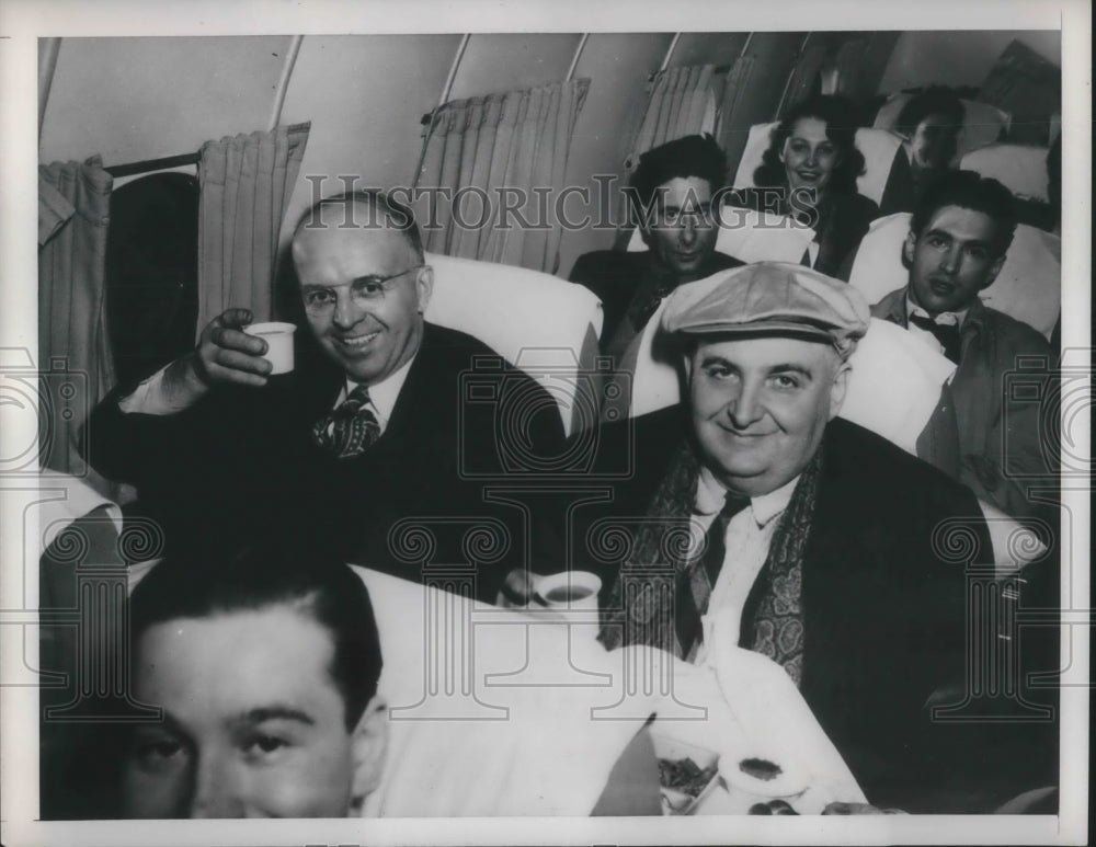 1948 Press Photo People enjoy snack on a airplane flight - nec72944 - Historic Images