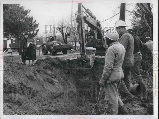 1968 Aurora Mayor Harry Griffith oversees sewer project - Historic Images
