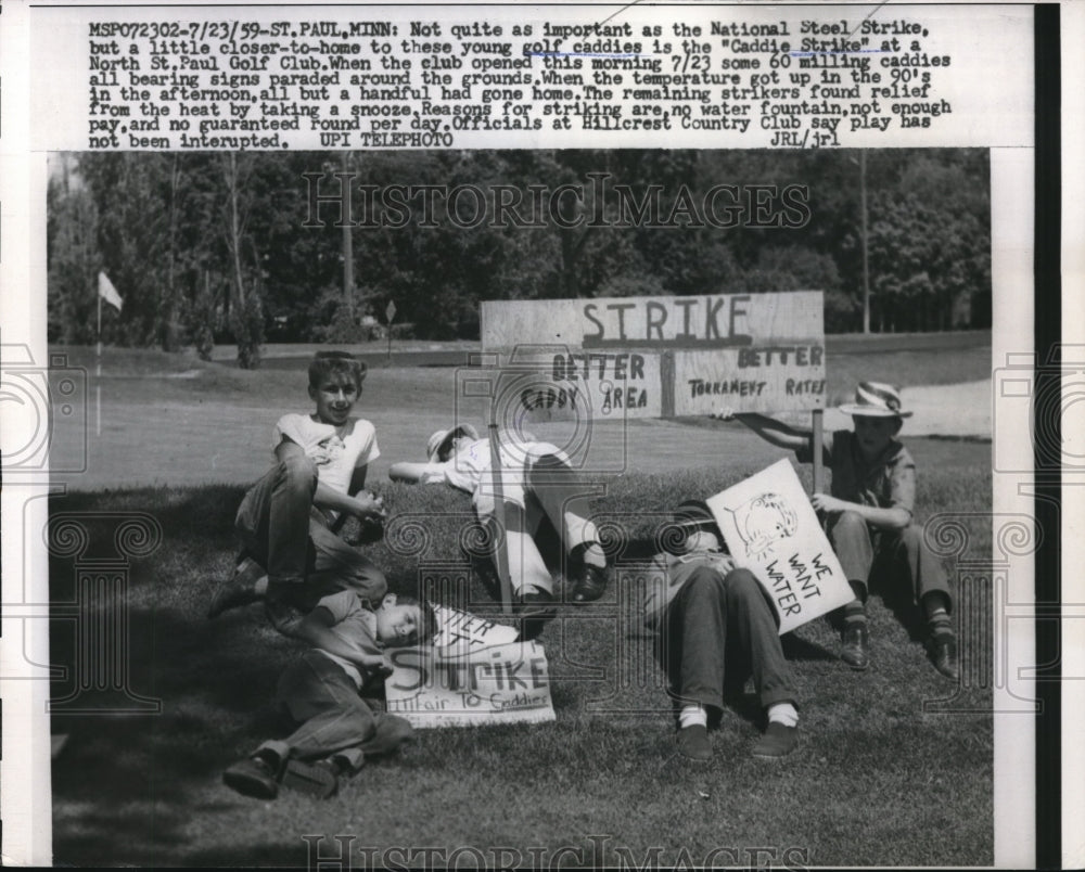 1959 Press Photo Golf Caddies Rest after Striking at Hillcrest Country Club-Historic Images