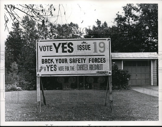 1968 Sgt. Kramer's house with large VOTE YES ISSUE 19 sign in yard - Historic Images