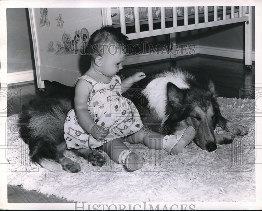 1950 Press Photo Tiny Karen Voegele pined for her dog, Rusty until he was found - Historic Images