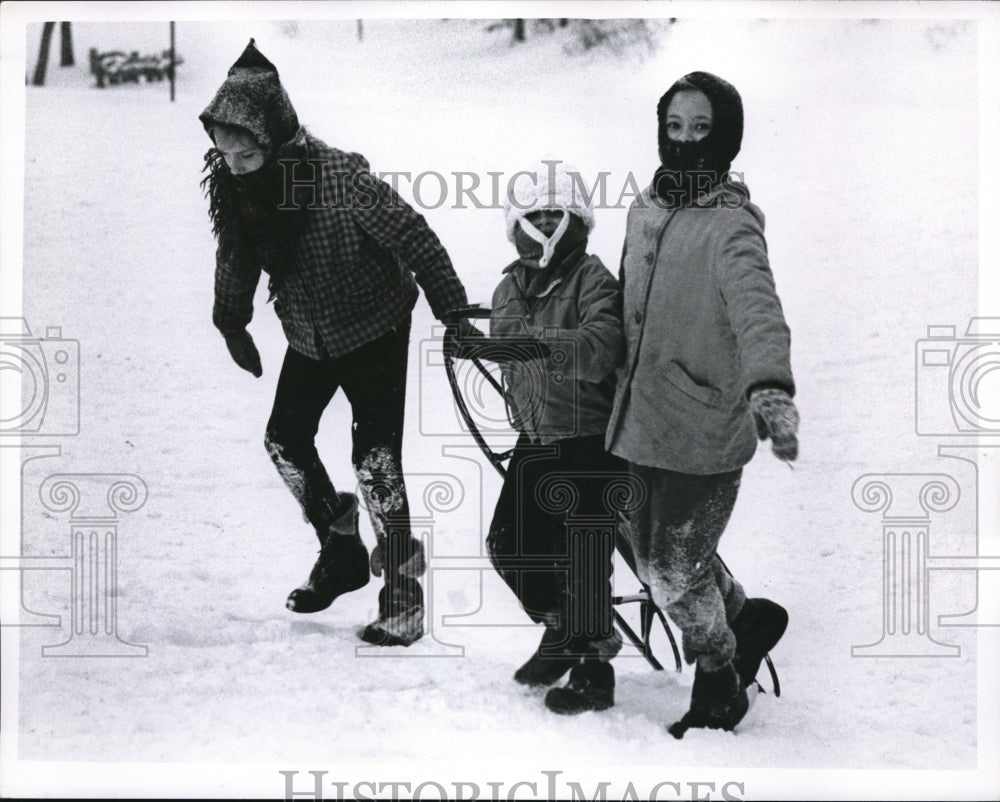 1965 Press Photo Hilda &amp; Joan King, Ruth Clough sledding in Cleveland - Historic Images