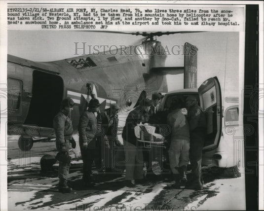 1958 Albany NY Charles Reed rescued by sno cat & copter in snow - Historic Images