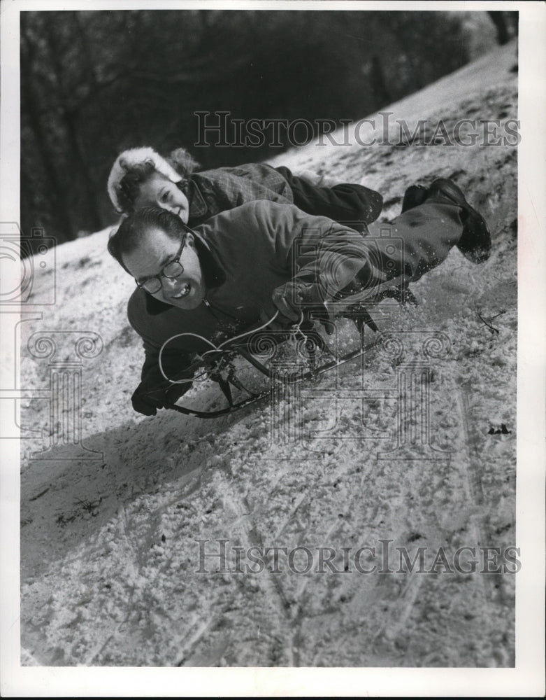 1955 Press Photo Robert Schultz &amp; daughter Sharon sledding in Cleveland - Historic Images