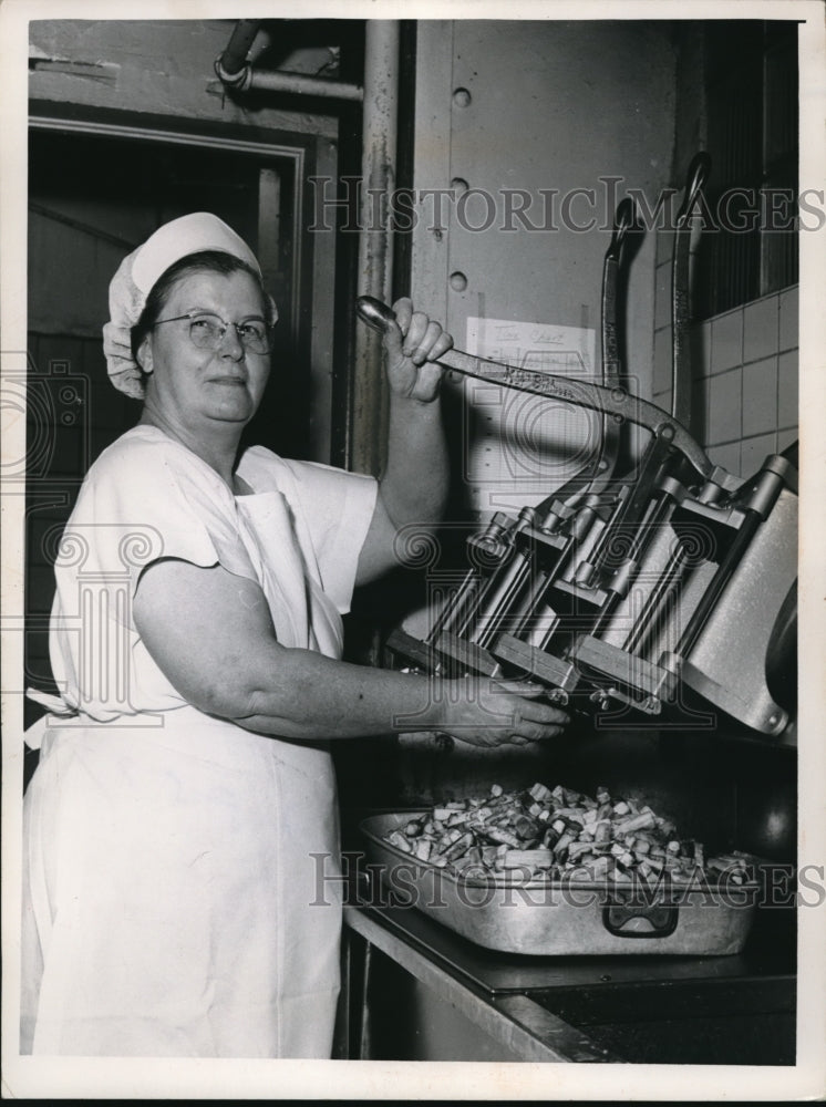 1956 Press Photo Mrs. Julia Zahnke works with a smile - Historic Images