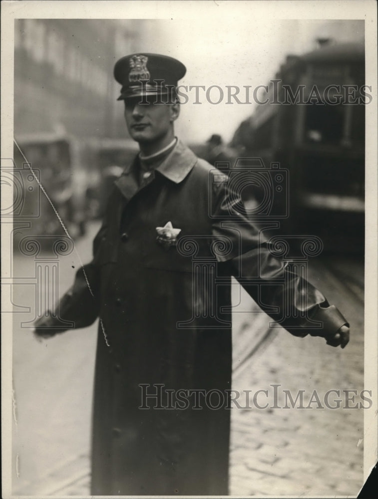 1926 Patiently doing his job is traffic officer R.J. Smith - Historic Images