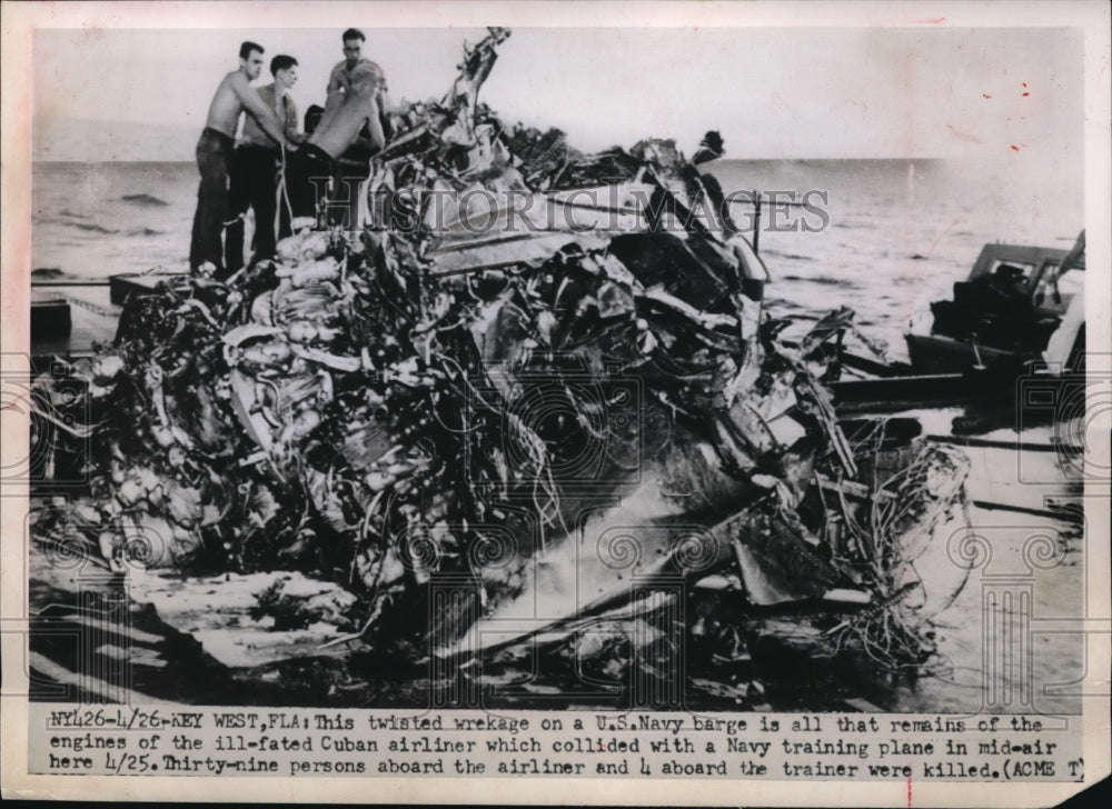 1951 Press Photo Wreckage of a Cuban airliner and a Navy training plane. - Historic Images