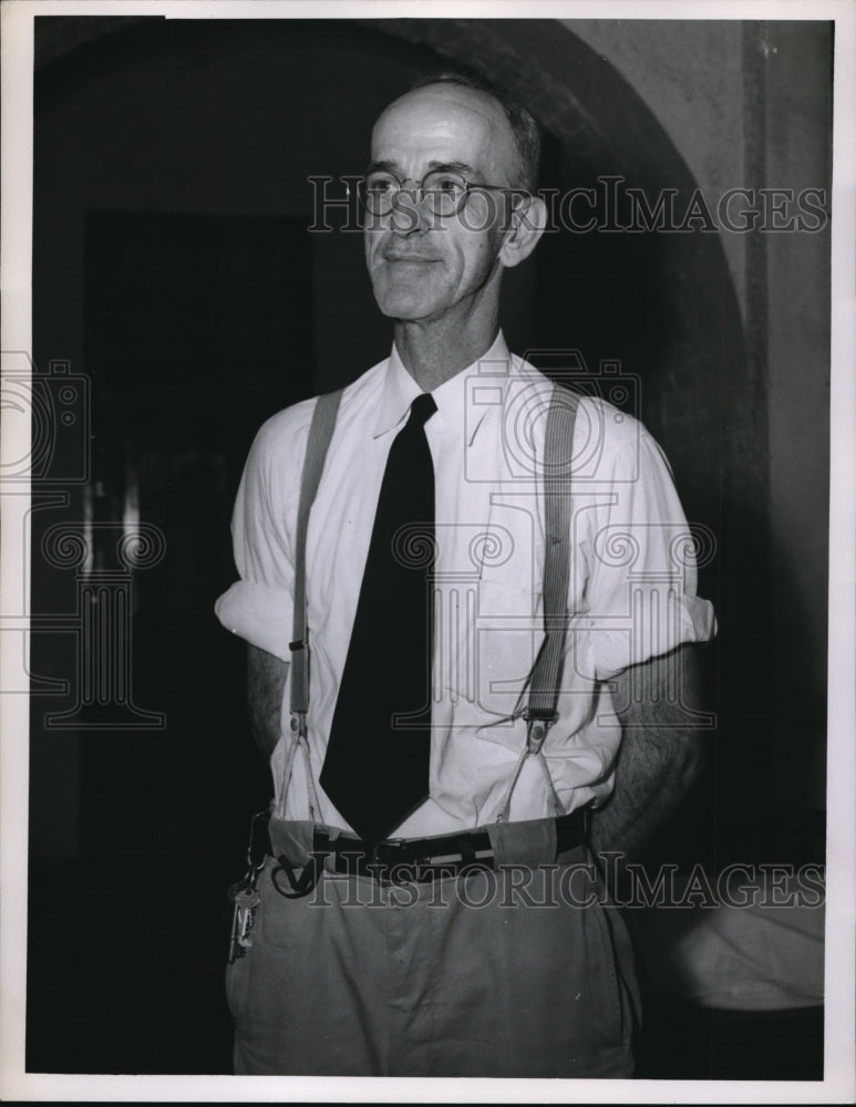 Press Photo A middle age man standing seriously - Historic Images