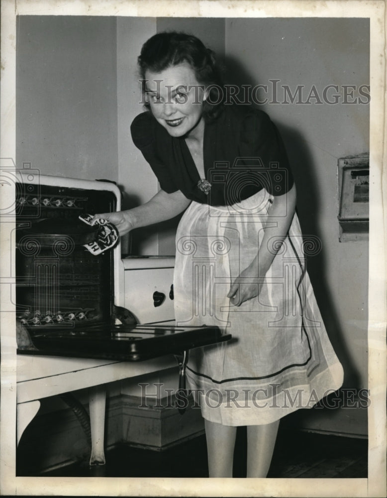 1939 Mrs William O Douglas at Silver Springs MD baking a cake-Historic Images